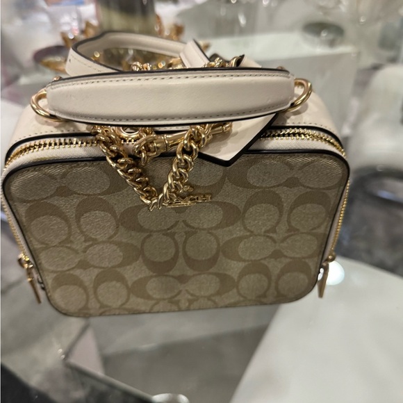 Coach Handbags - Coach Signature Canvas Crossbody Bag in Chalk and Tan